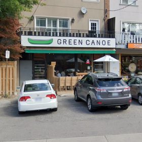 green-canoe-sign